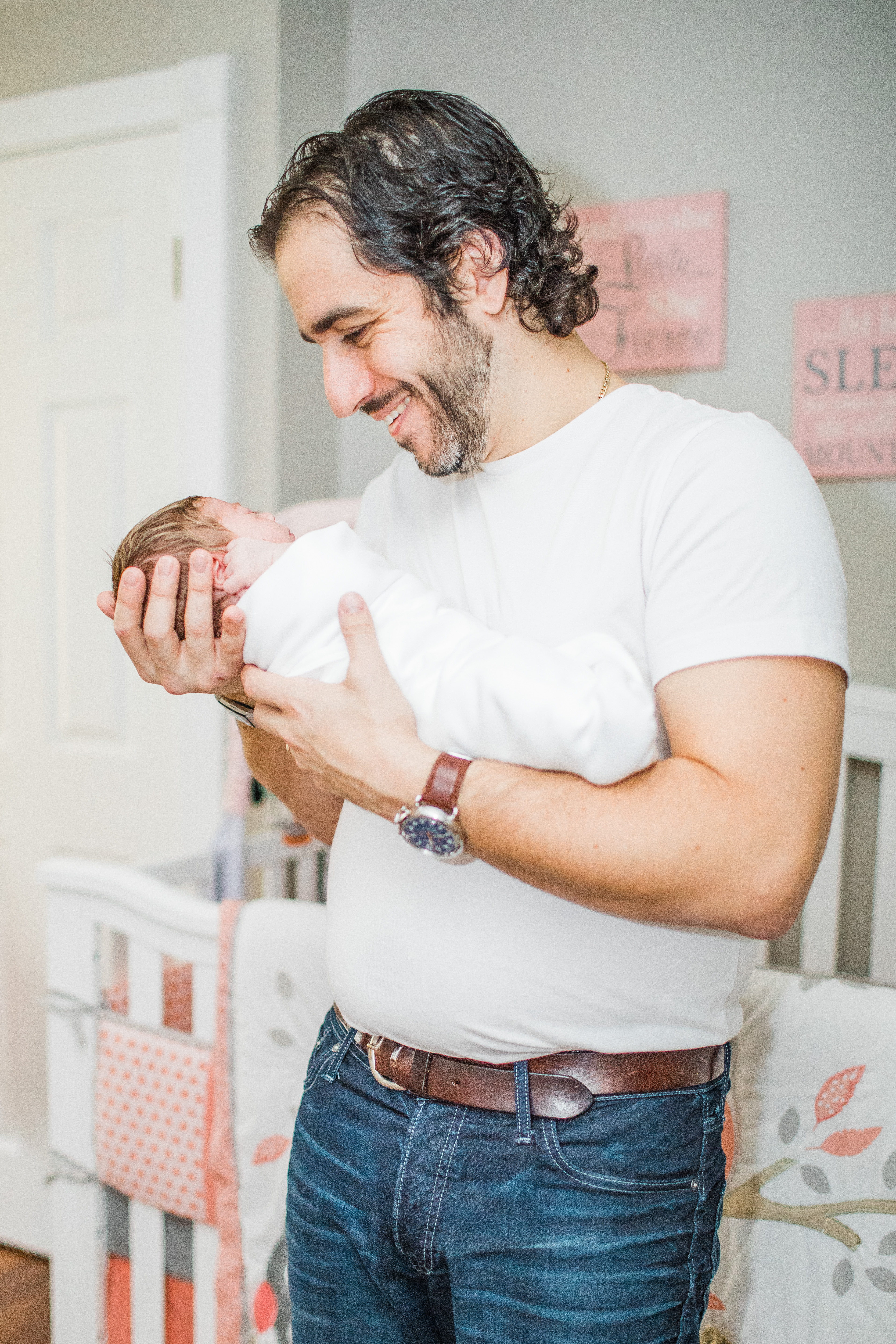 learned as a new mom new dad holding baby