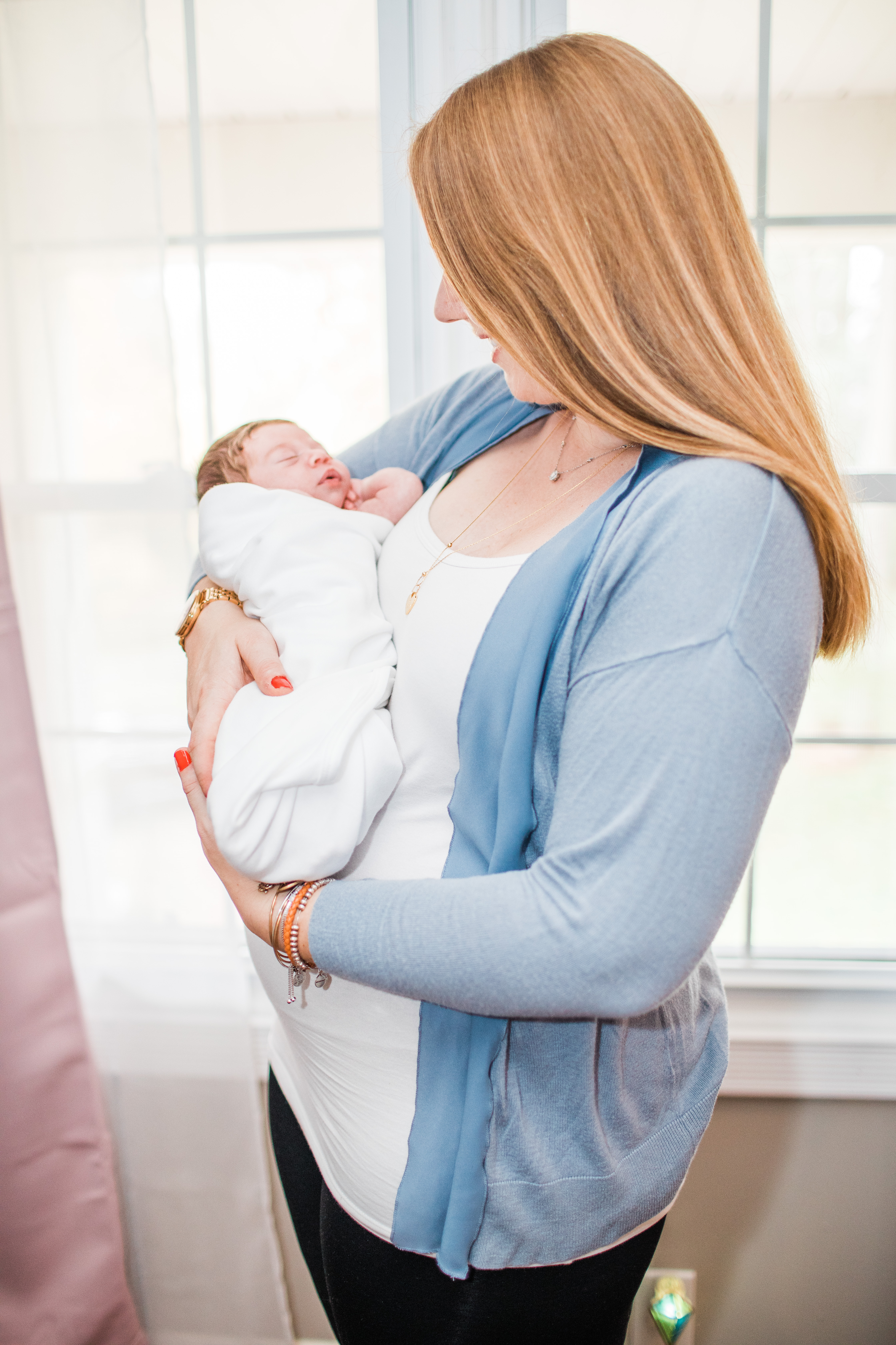 learned as a new mom new mom holding baby