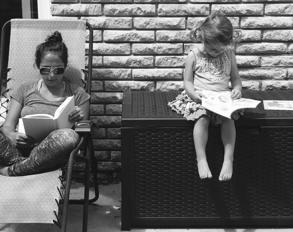 mother and daughter reading, black and white