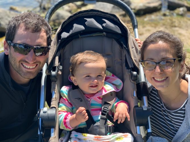 family of three on vacation, baby in stroller