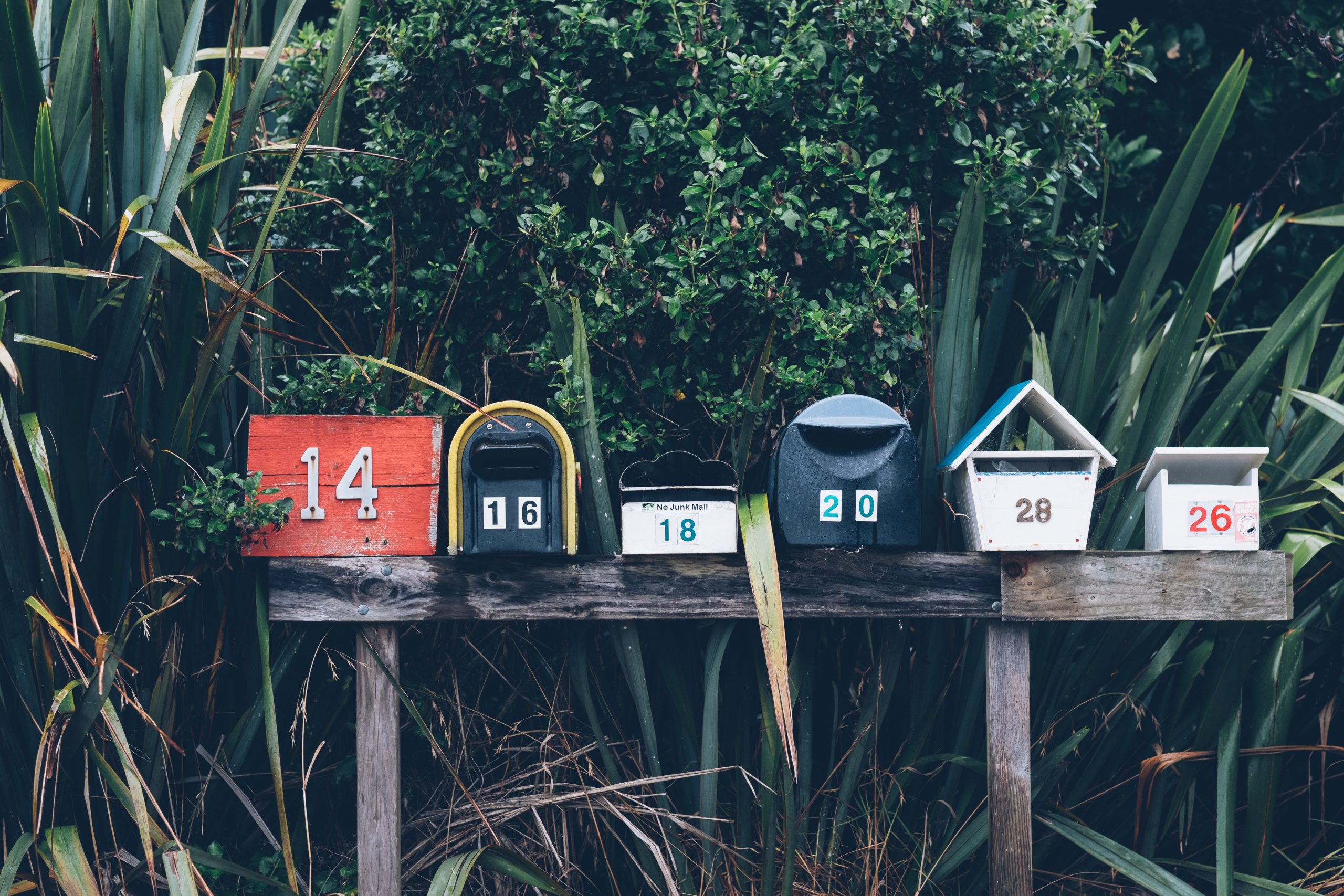 row of neighborhood mailboxes