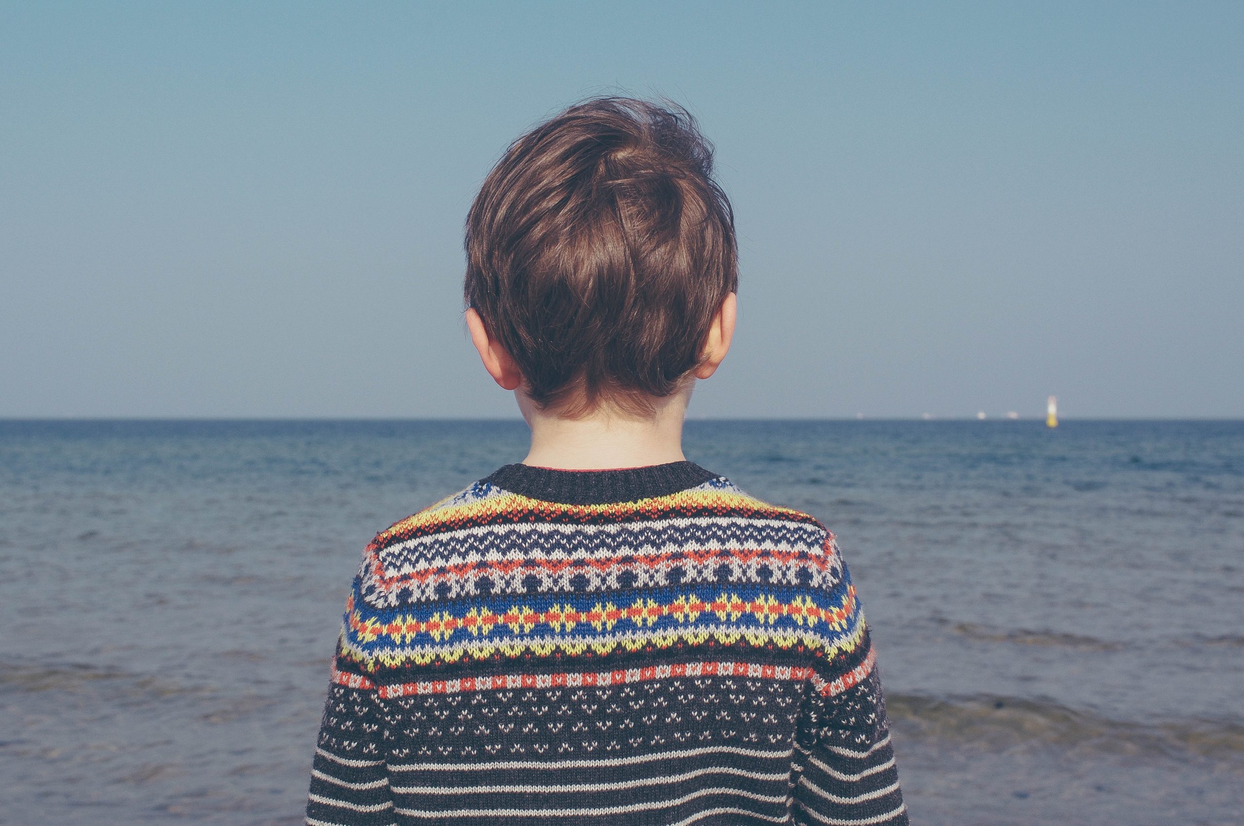 child looking out over the water, personal boundaries